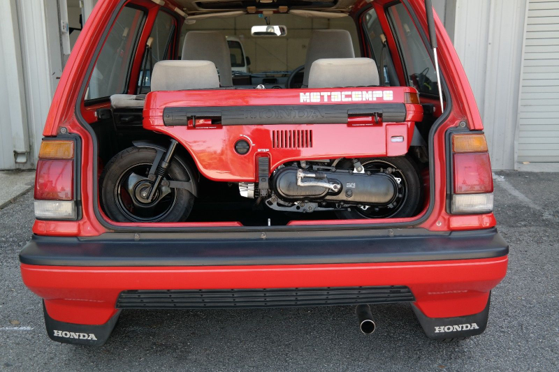 Illustration for article titled You Should Buy This Pristine 1985 Honda City R And Motocompo For $15,000 Right Now